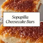 Sopapilla Cheesecake Bars with a flaky crust, creamy cheesecake filling, and a caramelized cinnamon-sugar topping, served on a plate.